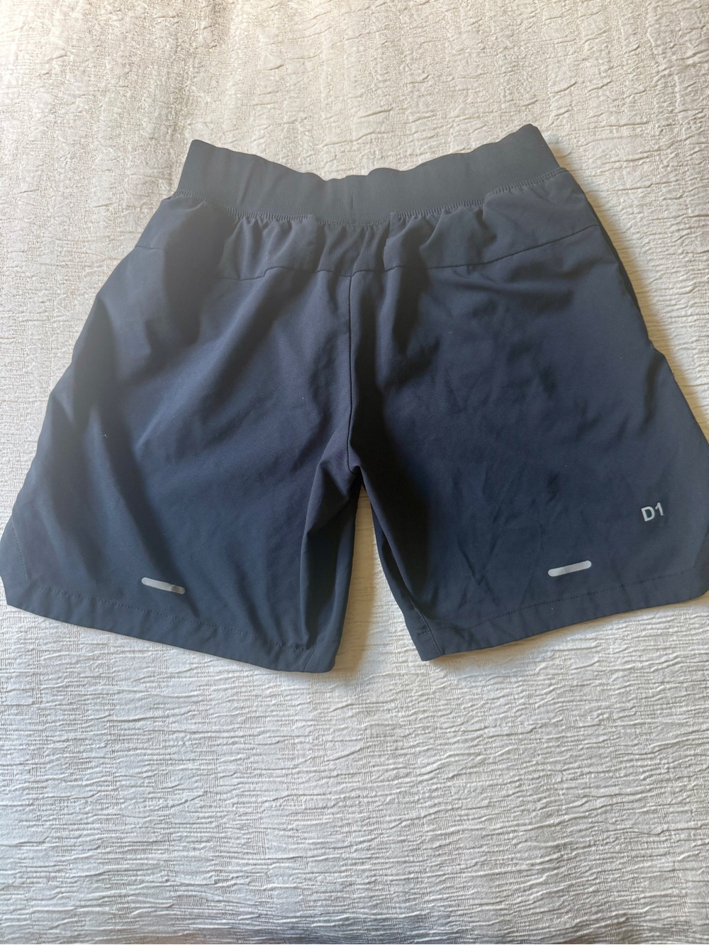 Asics Women's 7" Black Athletic Running Shorts with Reflective Details